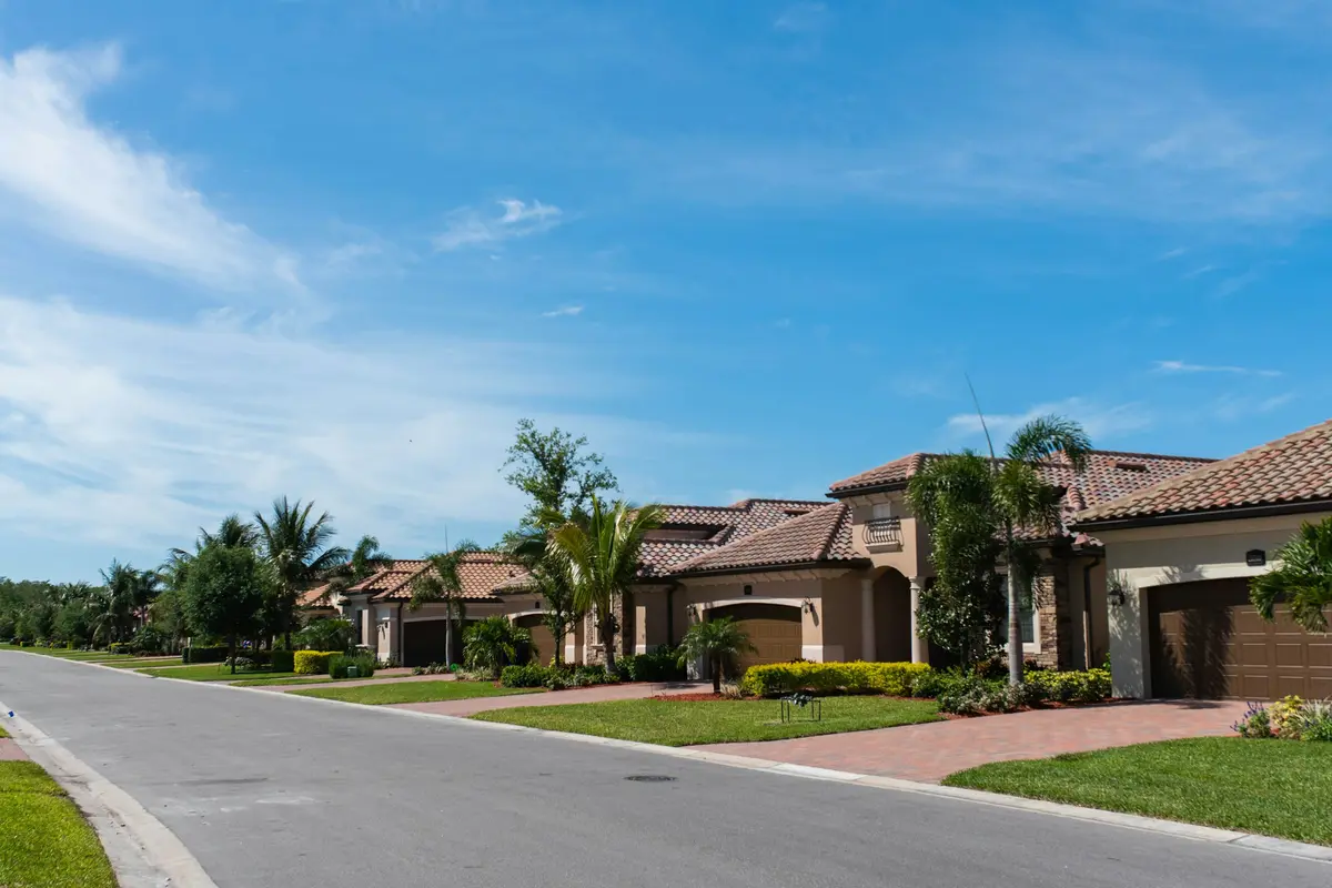 Florida home with established front-yard trees and landscaping